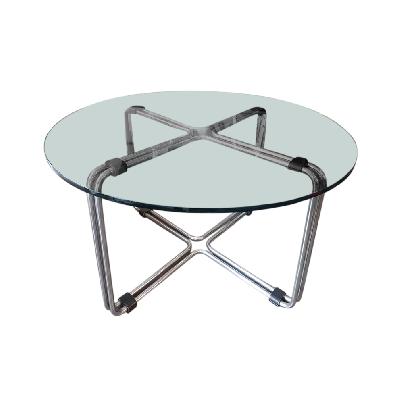 Mesa de comedor de acero tubular con cubierta circular de vidrio