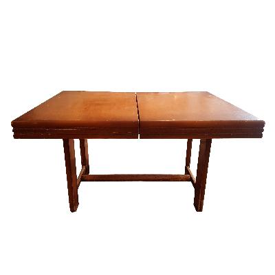 El Palacio de Hierro. Mesa de comedor con extensiones en madera